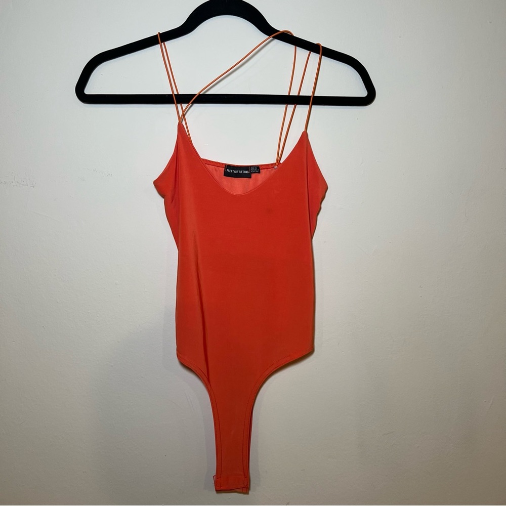 slinky cross-strap body suit
